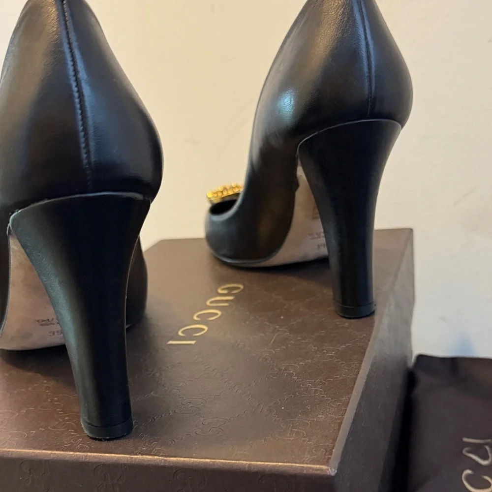 Gucci Black Heels with Iconic Gucci Gold Emblem
